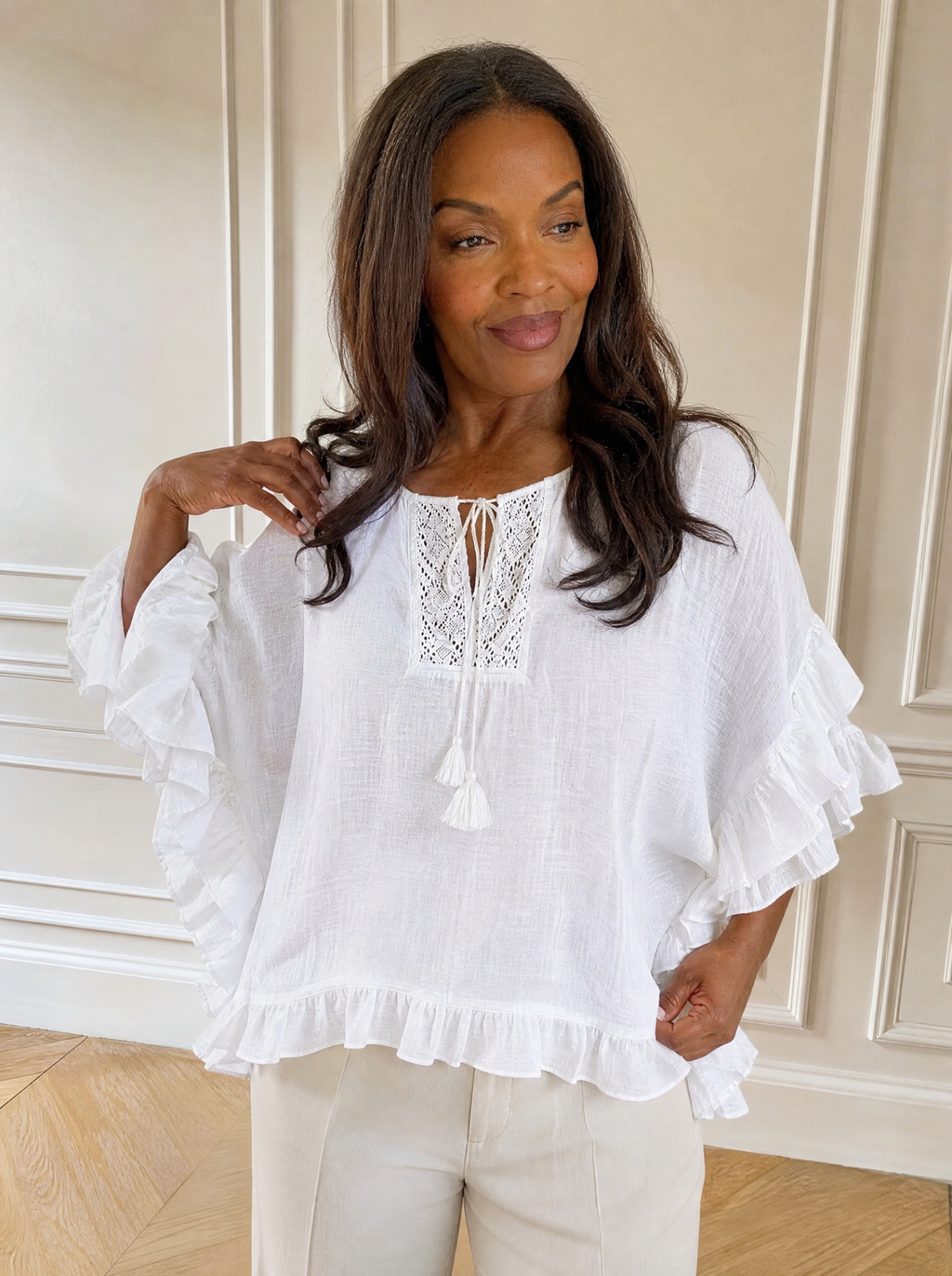 Full Size Tassel Tie Neck Ruffled Hem Blouse Plus Size - front