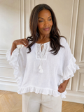 Full Size Tassel Tie Neck Ruffled Hem Blouse Plus Size - front